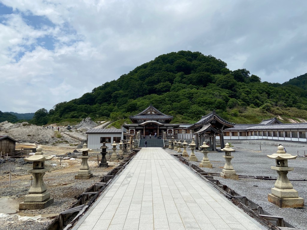 Entrance to Bodaiji Temple at Osorezan, where monks pray for lost souls in Japan’s most haunted Buddhist sanctuary.